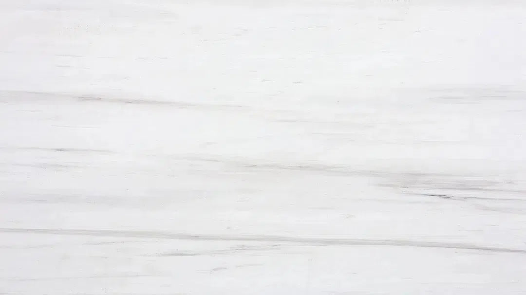 White marble surface with subtle gray veining in Bianco Dolomite Marble collection.