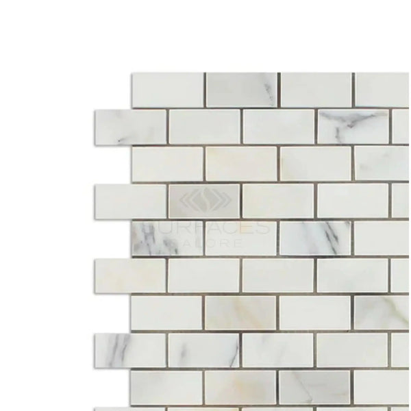 Calacatta Oliva Marble 1x2 Brick Mosaic Tile in polished white marble design