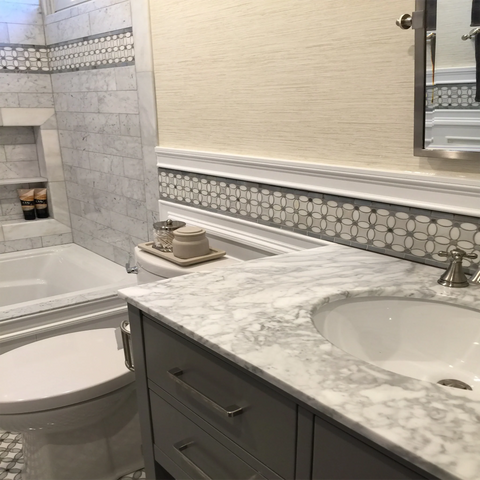 Black and white herringbone tile border from the Border/Listello collection.