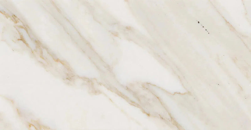 Veined marble slab from the Calacatta Gold Marble collection showcasing elegant patterns.