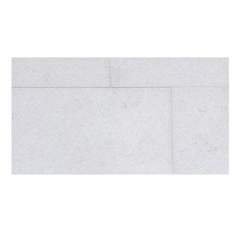 Dolce Ivory Limestone: white rectangular tiles with subtle speckled texture