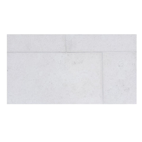Dolce Ivory Limestone: white rectangular tiles with subtle speckled texture