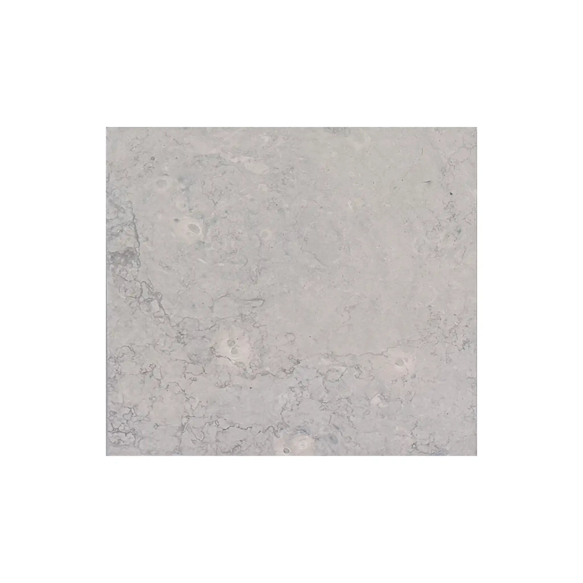 Light gray marble tile with subtle veining in Greyhaven Limestone collection