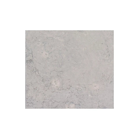 Light gray marble tile with subtle veining in Greyhaven Limestone collection