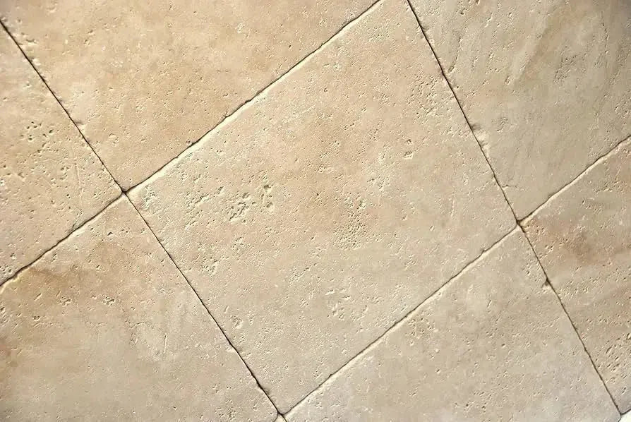 Beige Travertine tile floor in collection named Ivory Light Travertine.