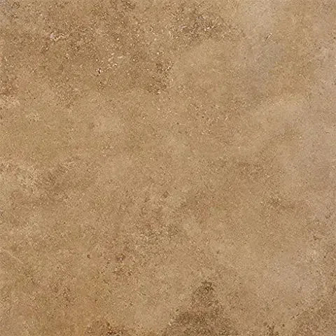 Textured brown tile from the Noce Travertine collection showcasing natural elegance.