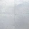 Four polished Aegean White Marble tiles displayed in a product listing