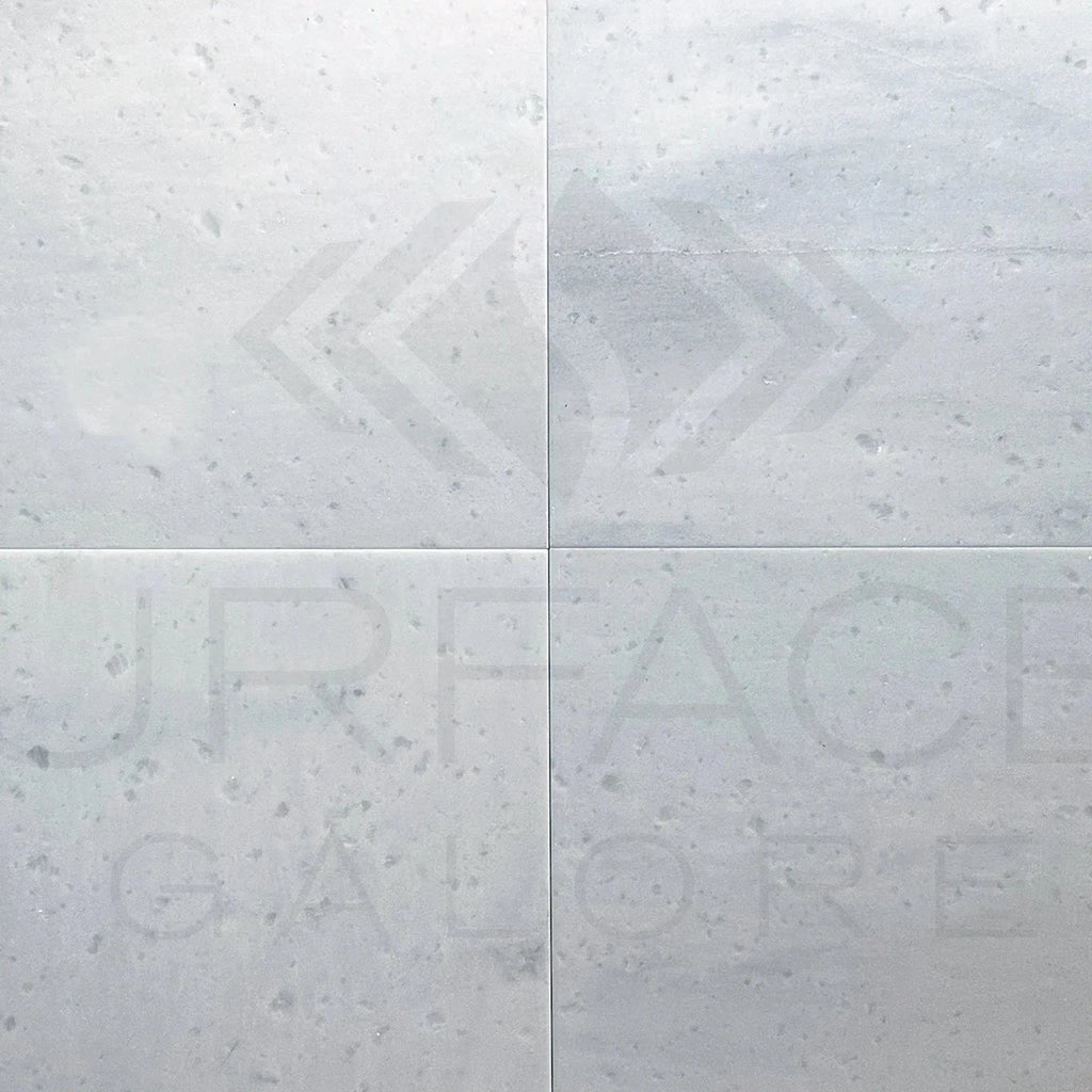White speckled tile squares of Agean White Marble 12X12 Polished Tile