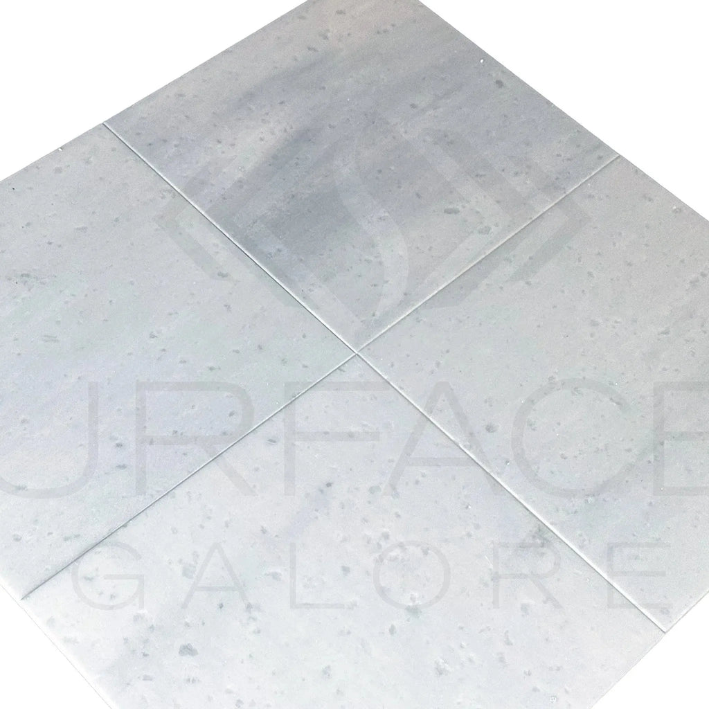 Square gray stone tiles from Agean White Marble 12X12 Polished Tile for flooring