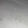 Gray stone floor tiles from Agean White Marble 12X24 Polished Tile for stylish decor