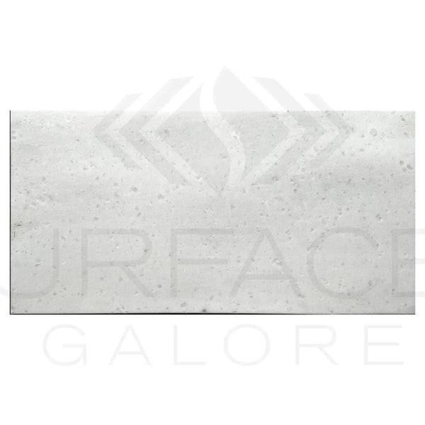White speckled countertop sample of Aegean White Marble polished tile 12X24