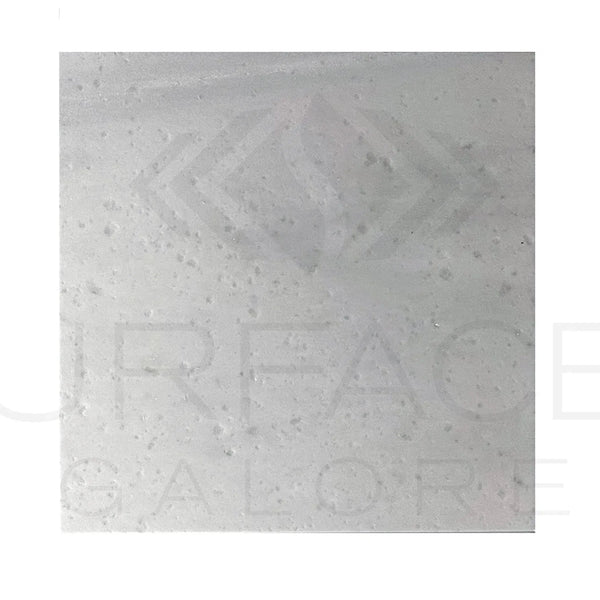 Translucent textured square tile of Agean White Marble in polished finish