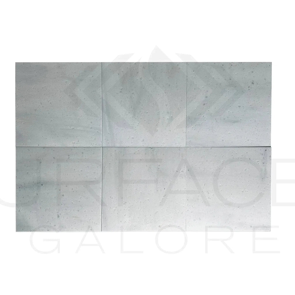 Rectangular gray tile arrangement featuring Agean White Marble / Snow White 18X18 Polished Tile