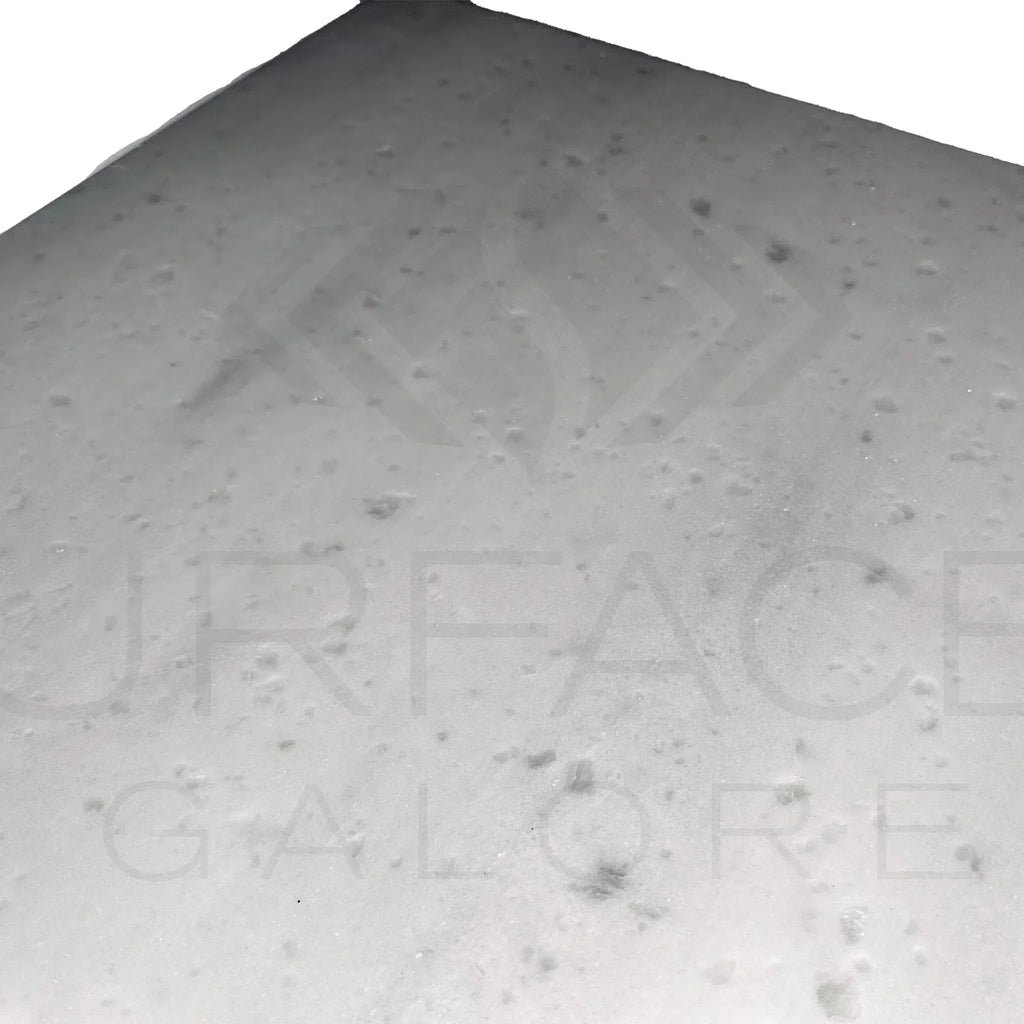 Textured white surface of Agean White Marble polished tile showcasing elegance and quality