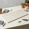 Alabastrino rustic white vein-cut travertine tile in beige with subtle gray veining and a natural rustic finish