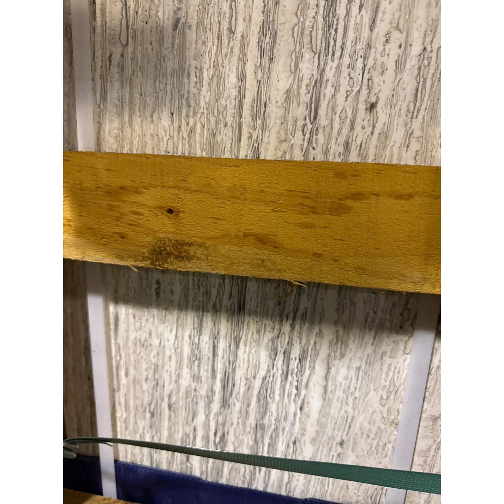 Stained yellow wooden plank suitable for use with Alabastrino Rustic White travertine tile