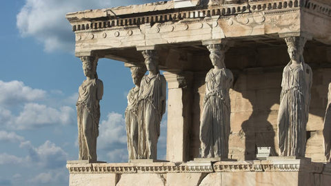 Ancient Greek caryatids illustrating the rich history of natural stone architecture.