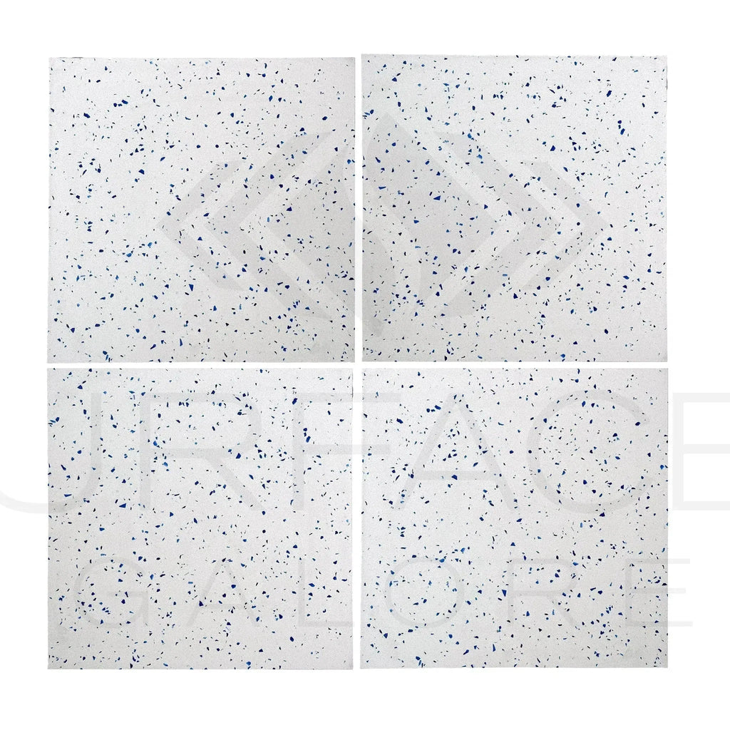 Four white Andromeda Quartz tiles with blue speckles, polished finish, 24X24 size