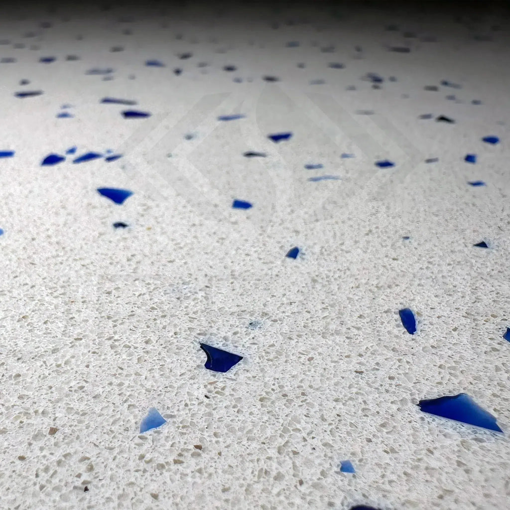 Andromeda Quartz engineered stone tile with white surface and blue flecks, 24X24 inches