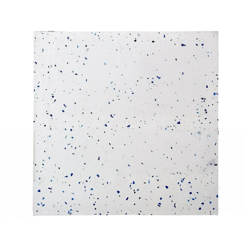White square tile with blue and silver flecks from Andromeda Quartz engineered stone