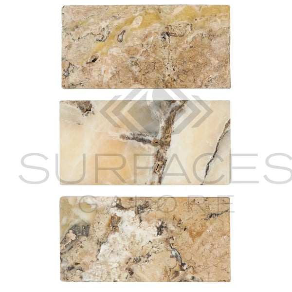 Three rectangular Antico Onyx Travertine 12X24 Filled Polished tiles displayed