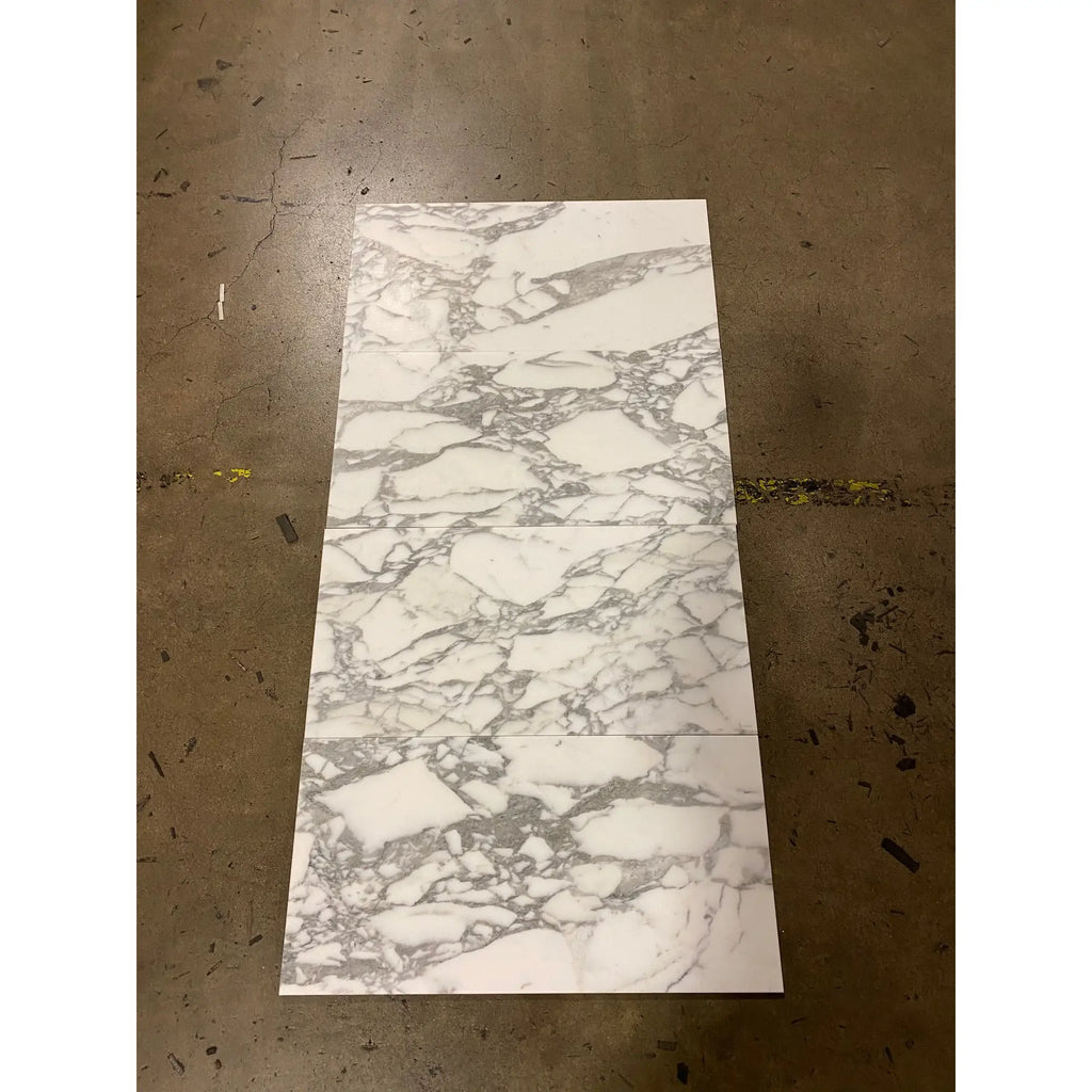 Rectangular Arabescato Corchia marble tiles with a polished or honed marble pattern