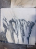 Arabescato Corchia 12x12 polished marble tile with white slab and dark gray veins