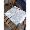 Polished white Arabescato Corchia marble tiles with elegant gray veining for sophisticated flooring