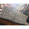 Stacks of bundled US dollar bills on Arabescato Corchia marble tile