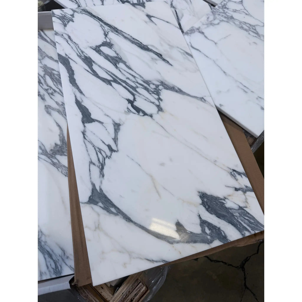 White marble tile arabescato corchia 12x24 with striking black and gray veining polished or honed finish