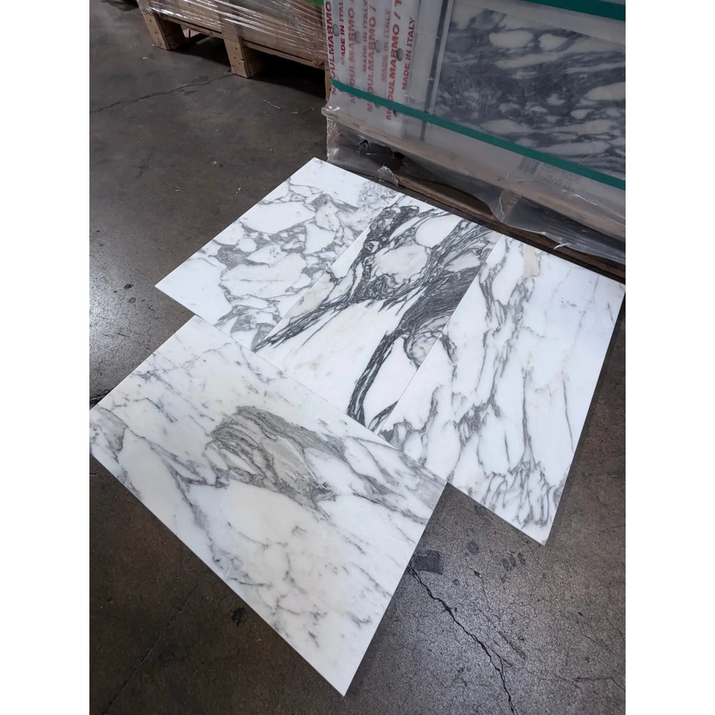 Luxurious Arabescato Corchia 12x24 marble tile with white slabs and black-gray veining