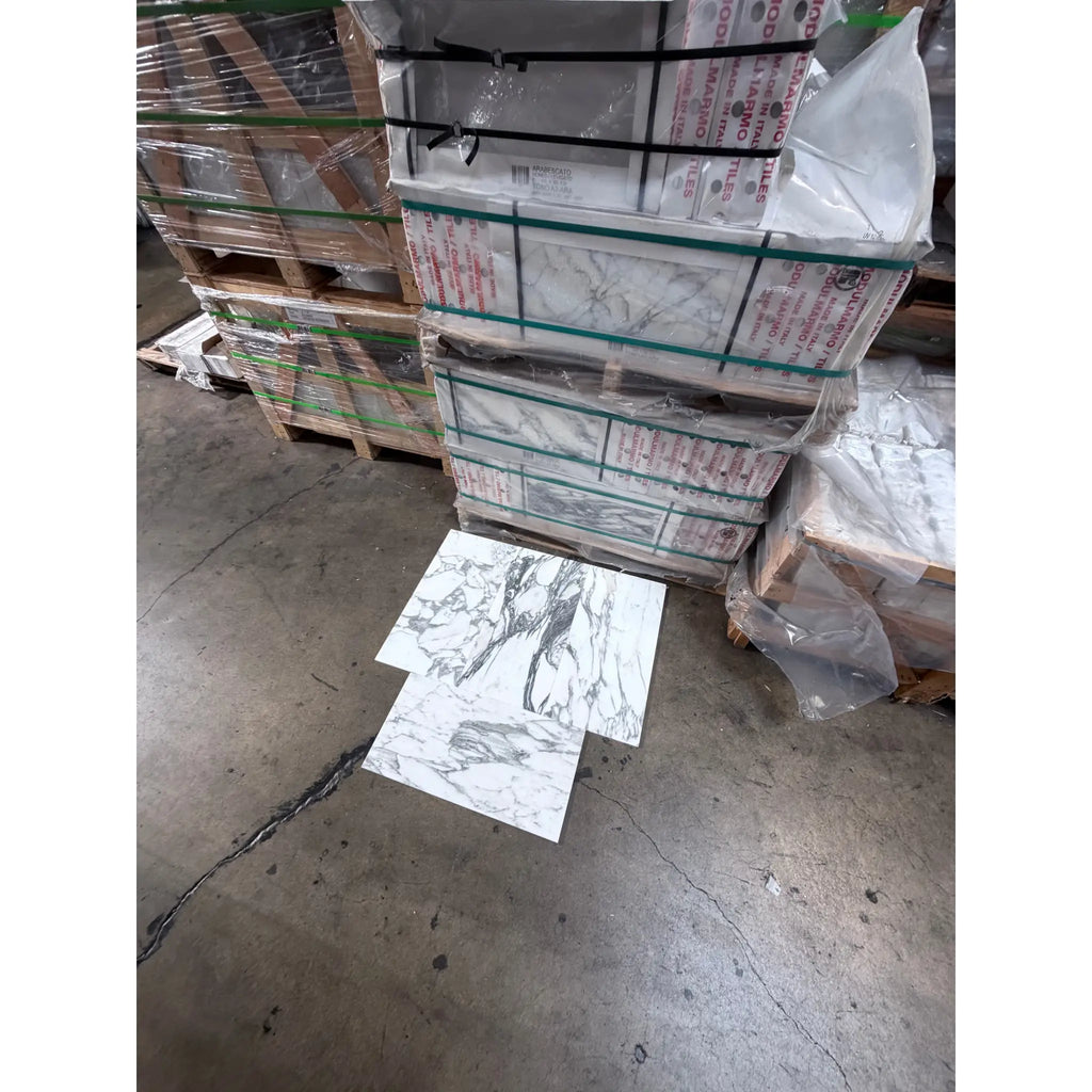 Arabescato Corchia 12x24 polished marble tile with gray veining on pallets