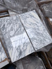 Polished Arabescato Corchia 12x24 marble tile with white and gray veining
