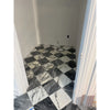 Black and white checkered marble floor featuring Arabescato Corchia 18X18 tile