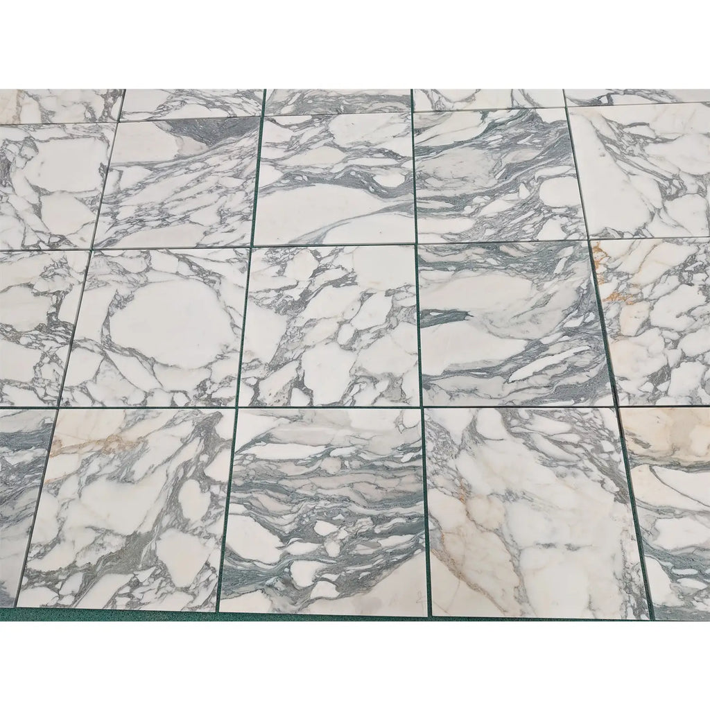 Arabescato Corchia 18x18 marble floor tiles with white and gray veins and a polished natural stone finish