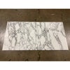 Two Arabescato Corchia 18X18 marble tiles showcasing elegant marble patterns
