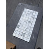 White and gray marble mosaic tiles in a grid pattern for Arabescato Corchia 2X2 product