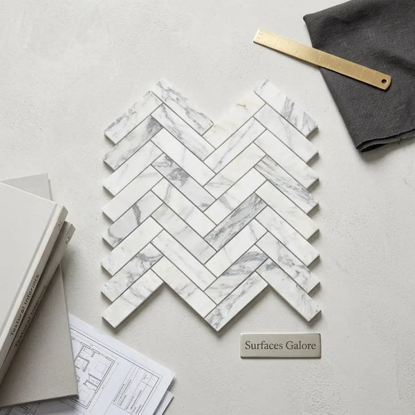 White marble arabescato corchia 1x4 herringbone mosaic tile with gray veining polished or honed finish
