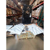 Black forklift with white stripes and red accents on Arabescato Corchia marble tile
