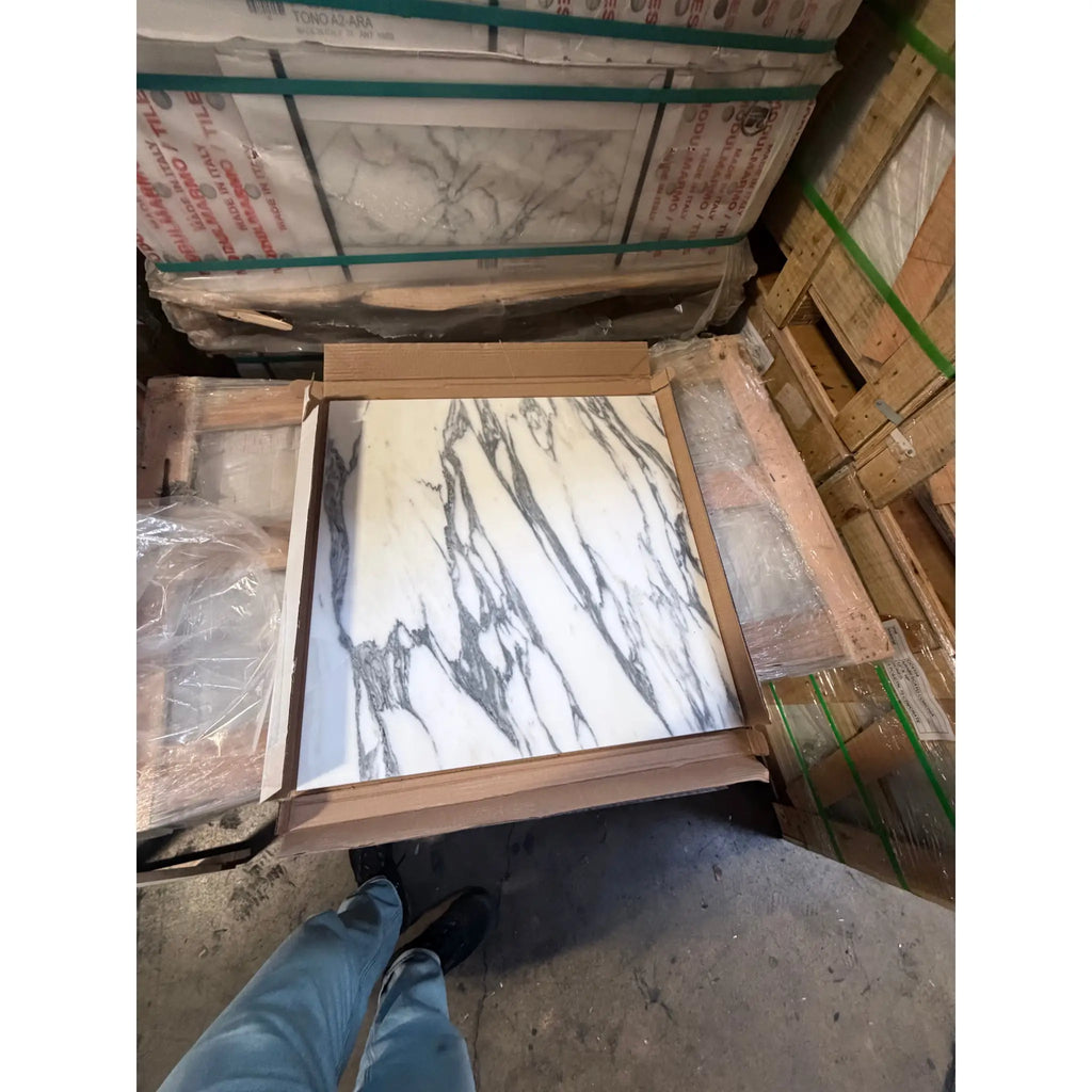 Arabescato Corchia 24x24 polished marble-look ceramic tile with gray white veining