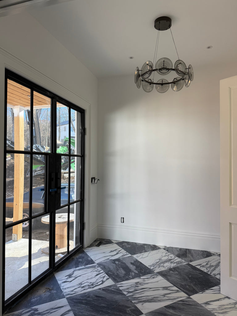 Polished Arabescato Corchia 24x24 marble tile with black and white geometric pattern