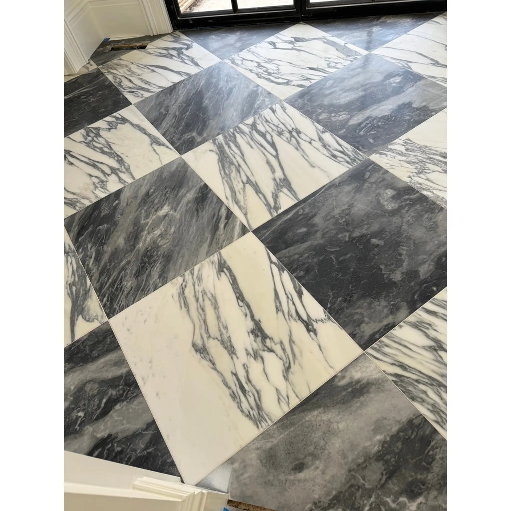 Black and white Arabescato Corchia marble tile in 24x24 checkered pattern