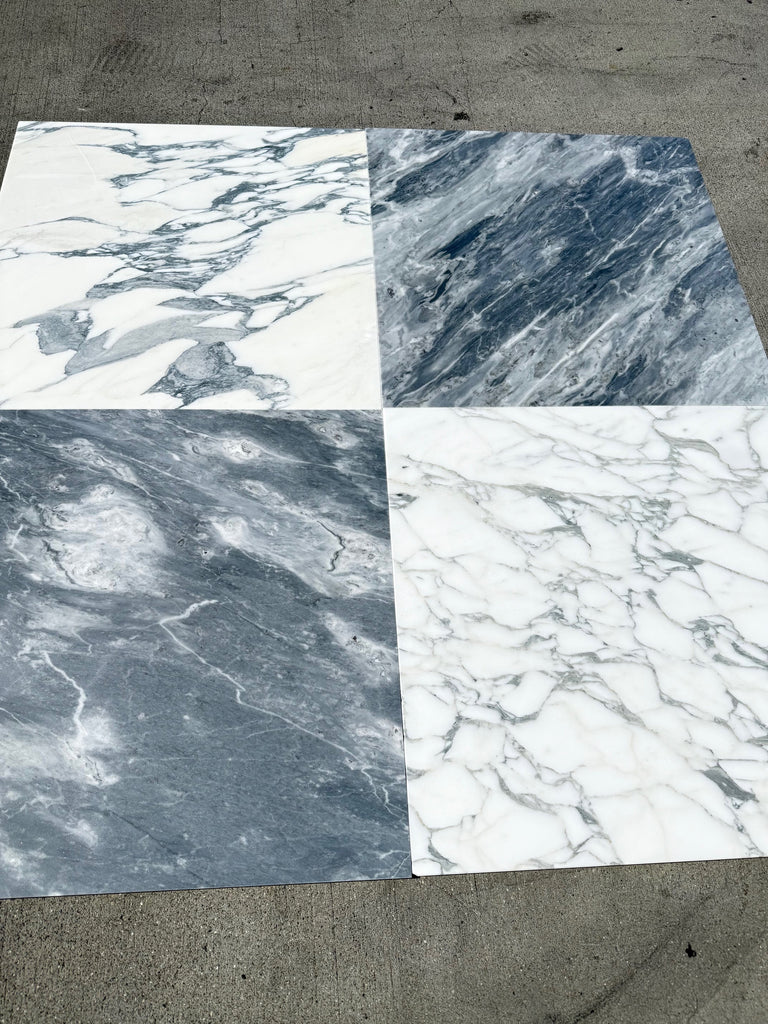 Four marble-look Arabescato Corchia tiles in two patterns and colors for sophisticated flooring