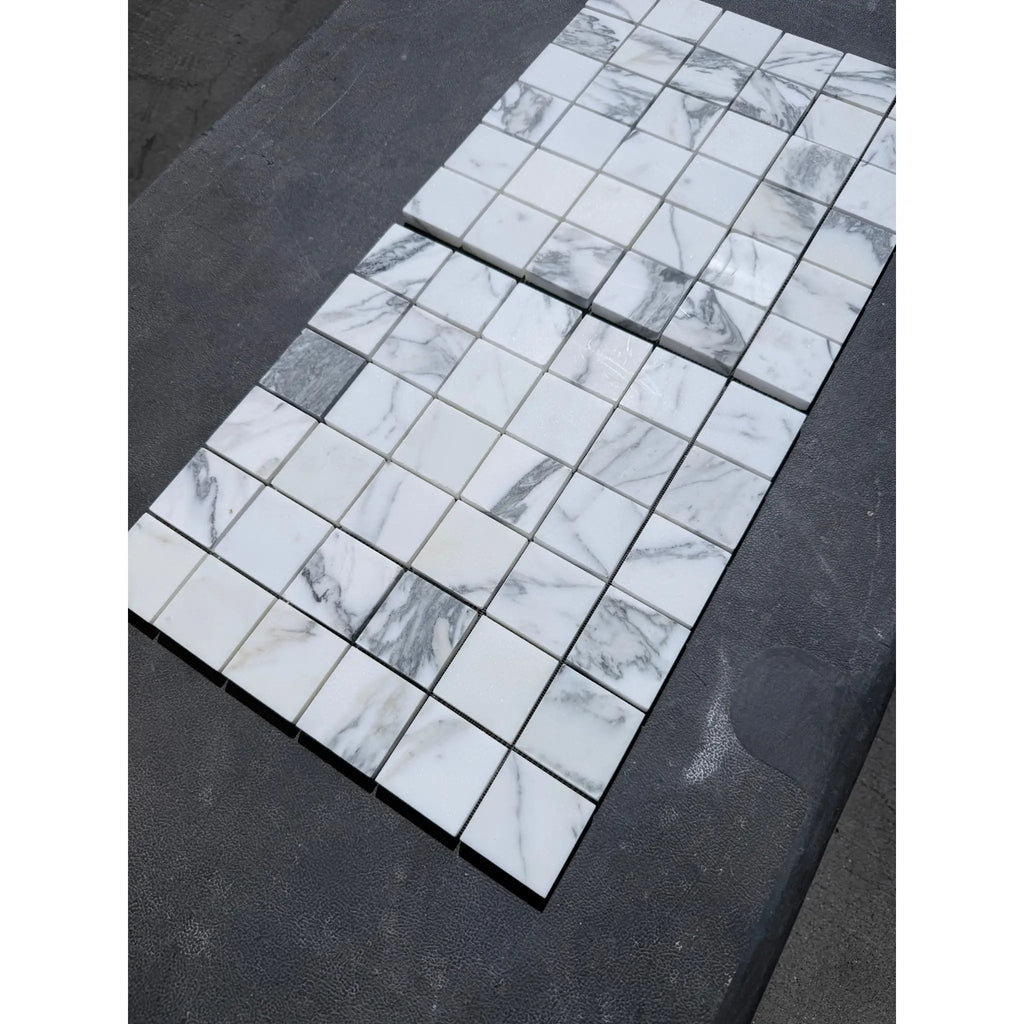 Two sheets of Arabescato Corchia marble mosaic tiles with grey veining