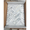 Arabescato Corchia white marble penny rounds in herringbone pattern