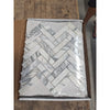 Arabescato Corchia white marble mosaic tiles in herringbone pattern