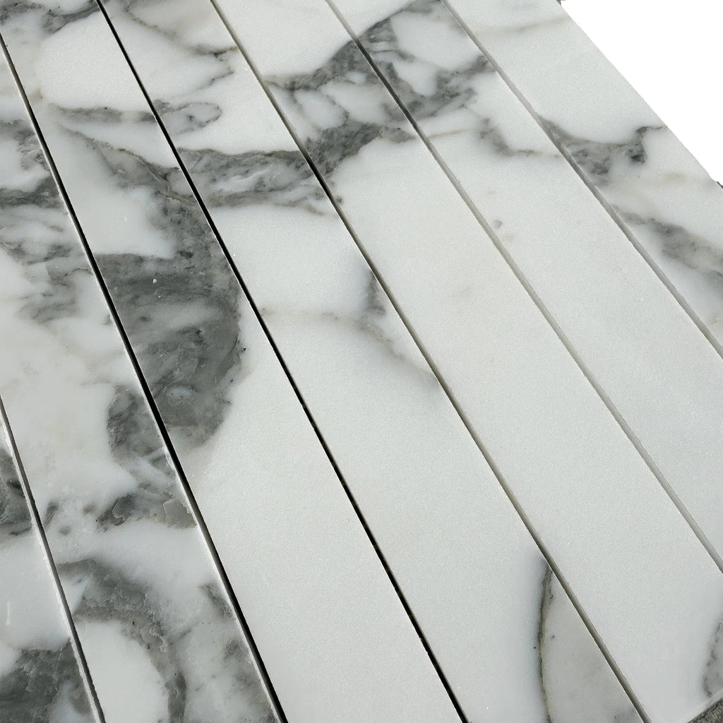 Marble-patterned rectangular tiles of Arabescato Corchia Marble Mosaic design