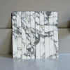 Marble-patterned tile strips of Arabescato Corchia Marble 1 1/8 X 12 Mosaic design