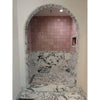 Arabescato Corchia marble mosaic shower with pink and white marble tiles and a curved archway design