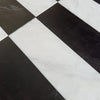 Black and white checkered pattern in Arezzo Carrara White and Nero Marquina 4X12 Set
